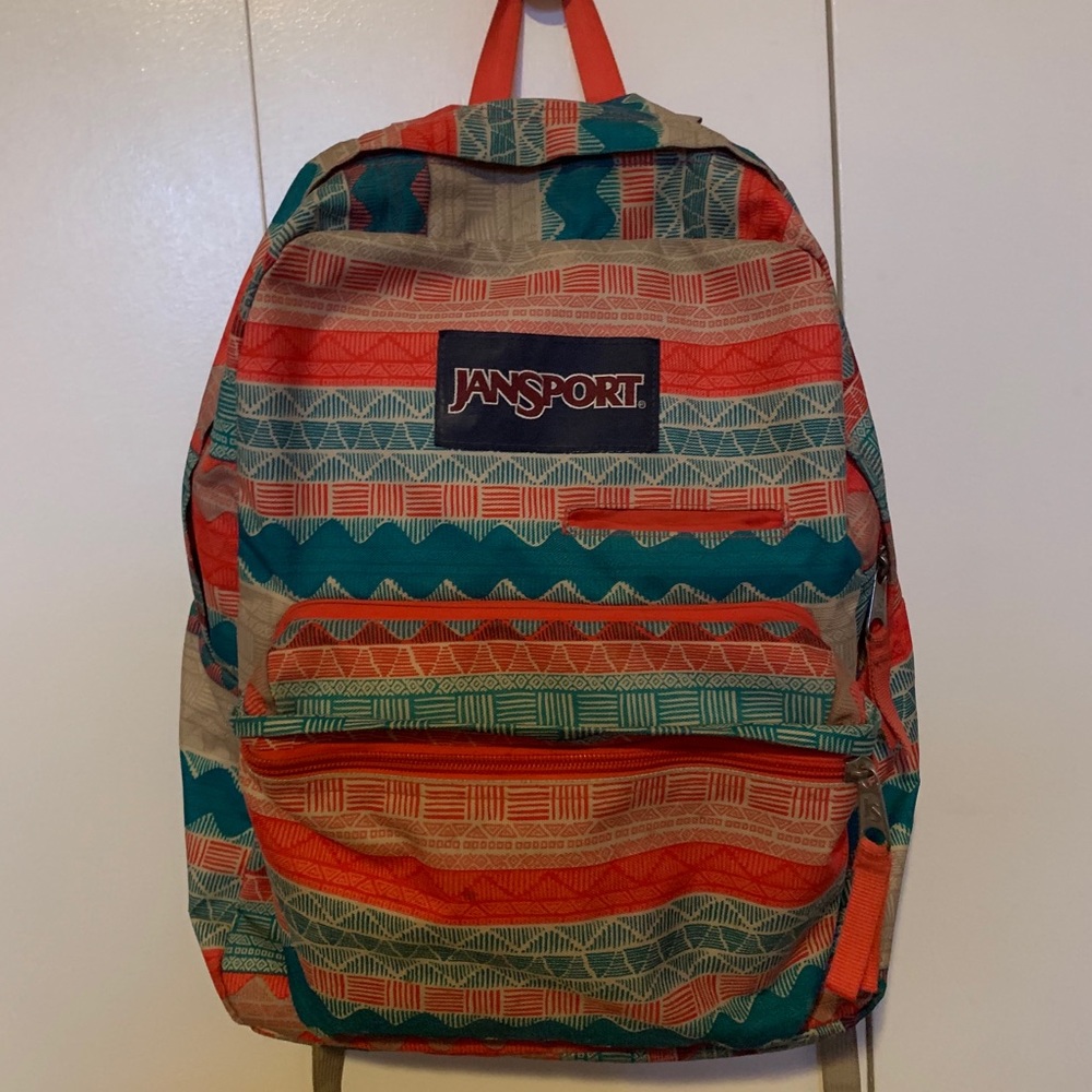 multi-colored Jansport backpack